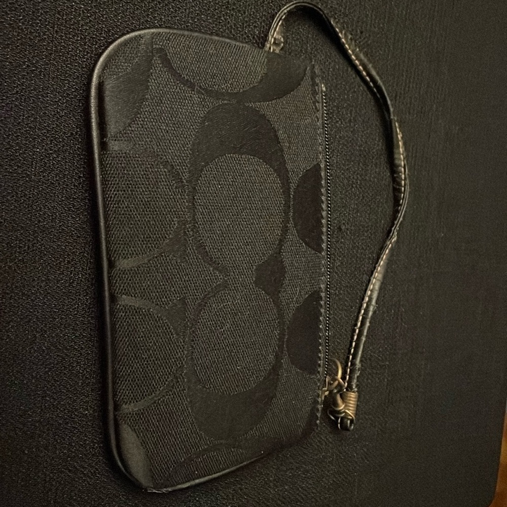 COACH Small canvas wristlet, black in black, some wear and tear on strap